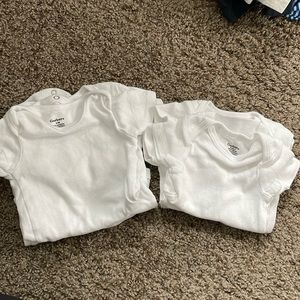 Six Gerber onesies